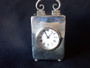 Antique William Comyns sterling silver carriage clock London 1903 with enamel Roman numeral dial