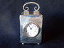 Antique William Comyns sterling silver carriage clock London 1903 with enamel Roman numeral dial