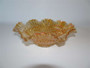 Antique carnival glass marigold bowl in imperial scroll embossed pattern.