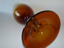 Mid century Italian glass vase consists of amber glass and vase with a clear glass ball stem.