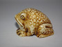 Japanese Meiji period ivory netstuke in for the form of a toad, incised mark to base.