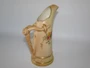 Antique Royal Worcester blush ivory porcelain ewer dated 1911 with hand-painted floral decoration and distinctive stag horn-style handle, 17cm tall.