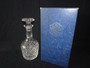 Vintage Stuart crystal decanter with cut diamond pattern, with original box.