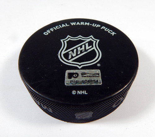 2019 Calgary Flames at Philadelphia Flyers Game Used Black Warm Up Puck DP38895