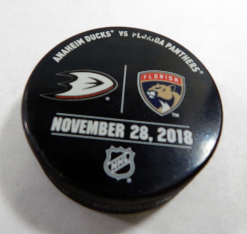 Florida Panthers Vs. Anaheim Ducks Game Used Black Warm Up Puck DP61360