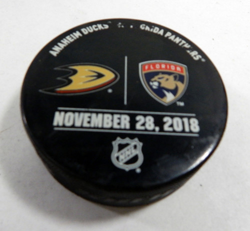 Florida Panthers Vs. Anaheim Ducks Game Used Black Warm Up Puck DP61400