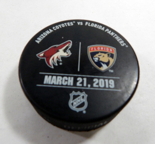 Florida Panthers Vs Arizona Coyotes Game Used Black Warm Up Puck DP61334