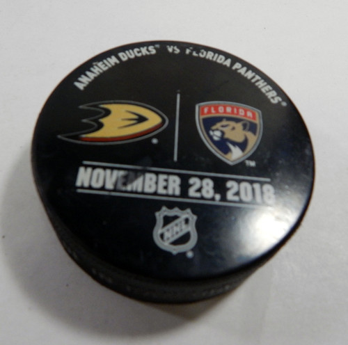 Florida Panthers Vs. Anaheim Ducks Game Used Black Warm Up Puck DP61355