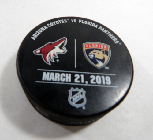 Florida Panthers Vs Arizona Coyotes Game Used Black Warm Up Puck DP61391