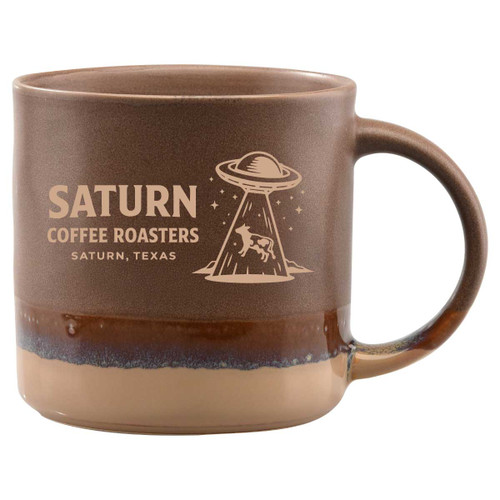 This brown reactive glaze ceramic mug delivers a warm, grounded aesthetic that complements custom logos and artwork while feeling right at home in coffee shop and retail environments. Built for daily use and strong brand presentation, it offers a substantial hand-feel and visual depth that appeals to customers browsing for quality, collectible drinkware. The naturally varied glaze finish enhances its handcrafted character, helping elevate branded mugs from simple giveaways to retail-ready merchandise.