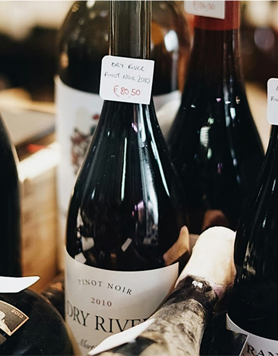 a wine bottle glimmering in sunlight
