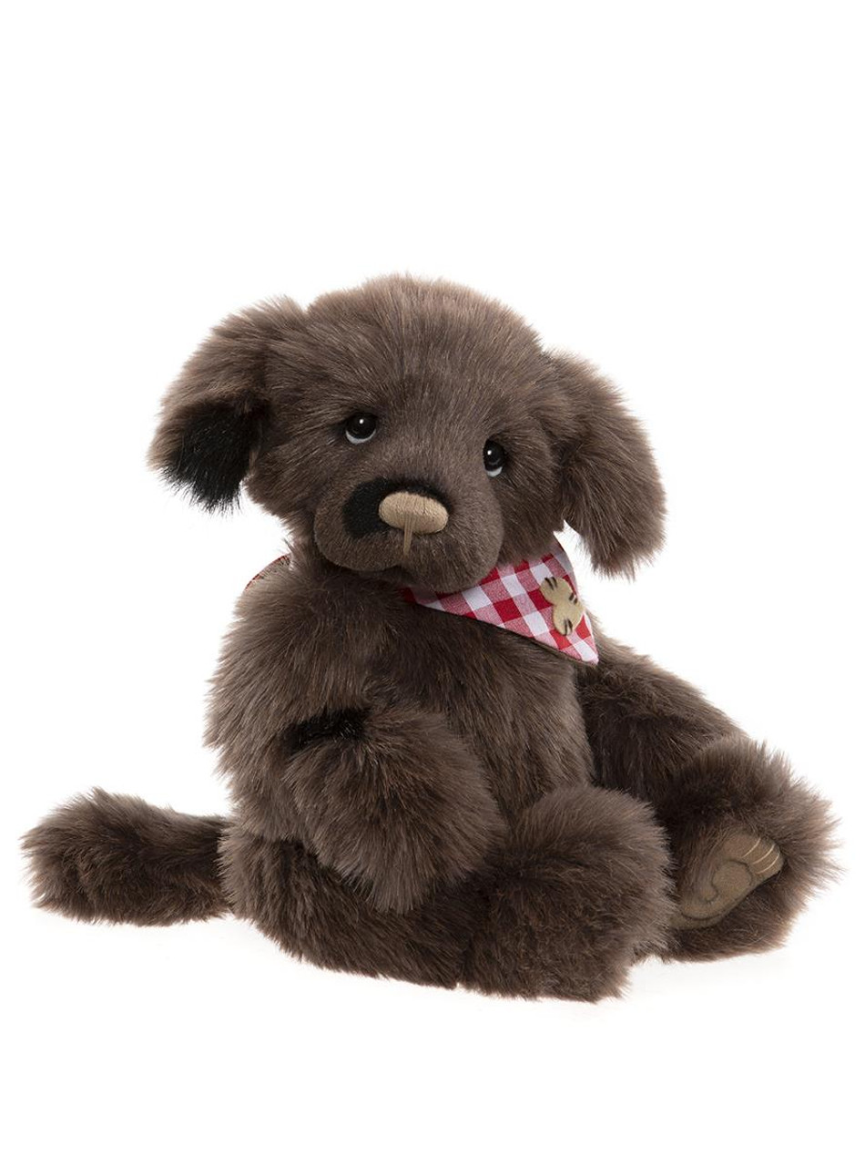 Plush toy of a teddy-style chocolate puppy