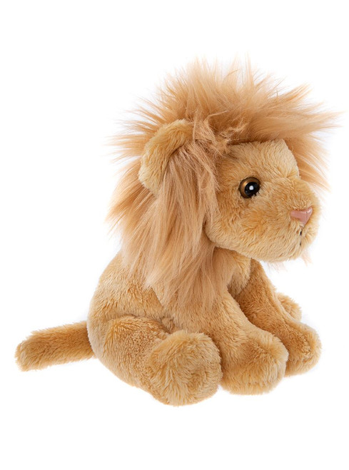 A golden-brown lion plush toy with a fluffy mane sits upright against a white background, featuring shiny brown eyes and a pink nose.