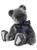 A grey plush Charlie Bear sits upright against a white background, wearing a large navy satin bow tie, with light-coloured paw pads visible on its feet and hands.