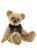 A golden-beige plush teddy bear sits upright, displaying large paws and feet, wearing a dark brown satin bow tie with a small heart charm pendant.