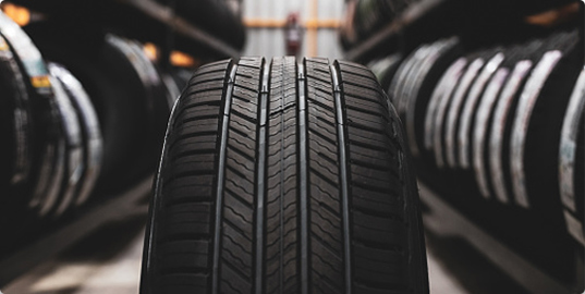 Close-up of a tire in a tire warehouse