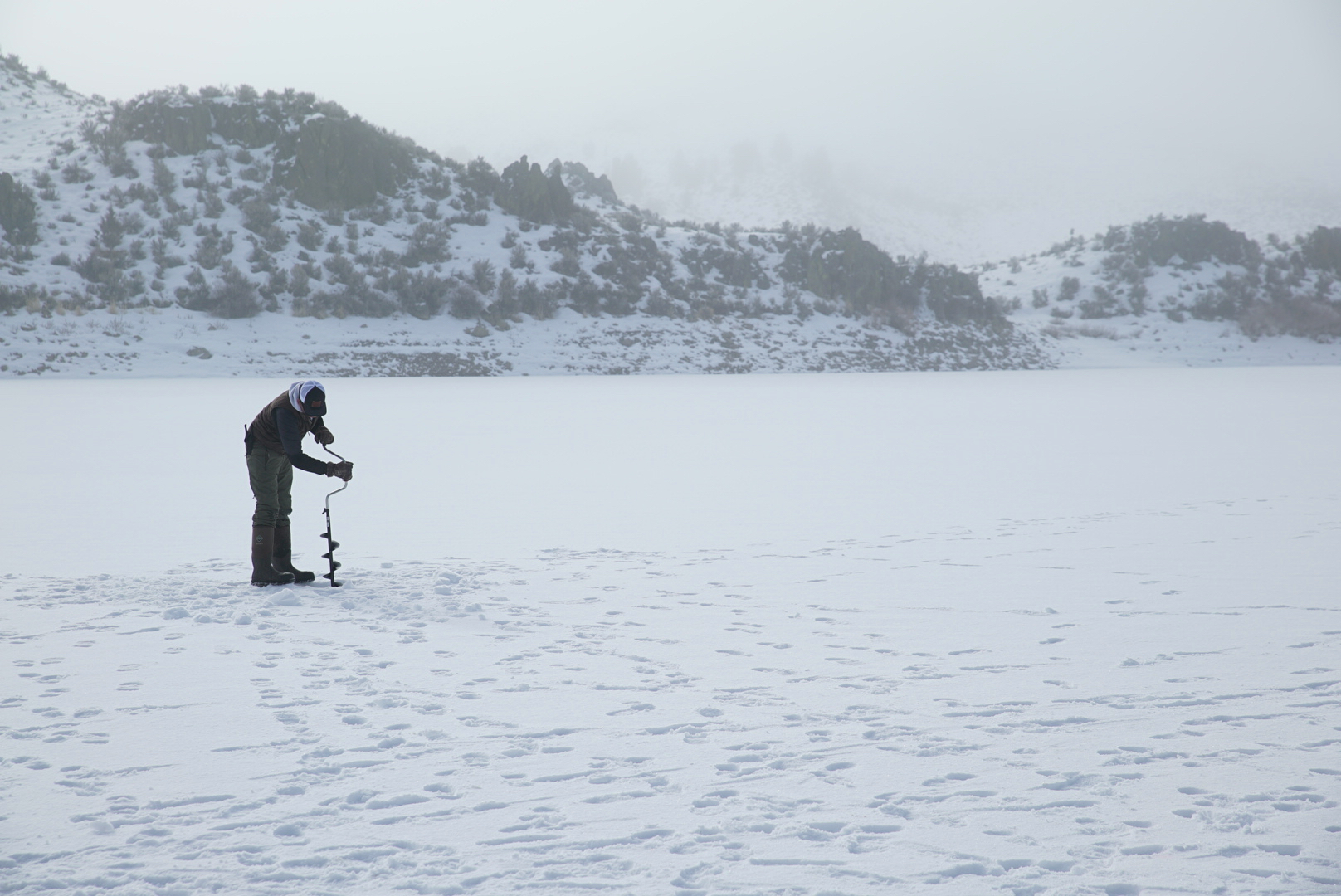 Teen ice fishing and sighting deer