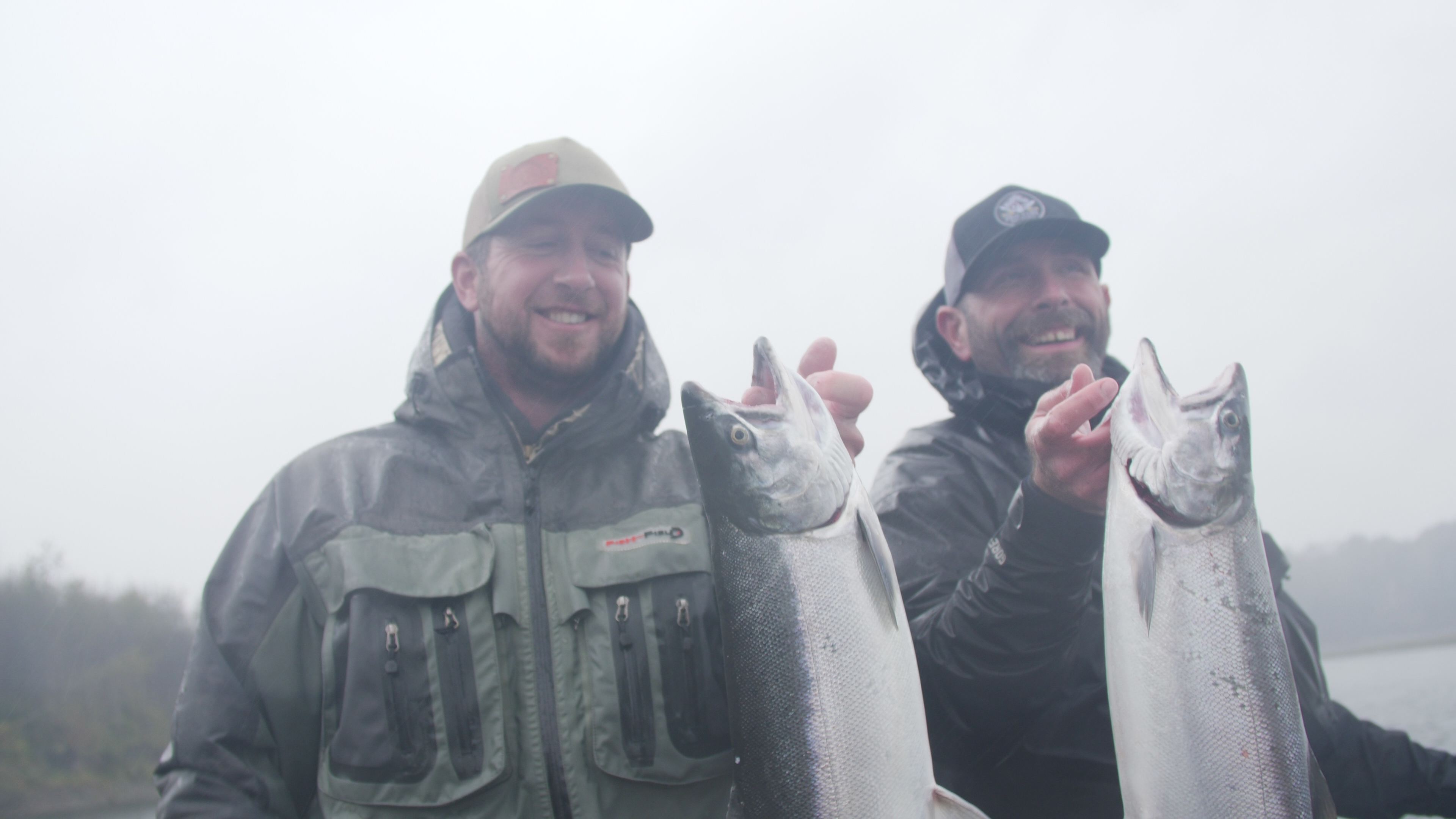 Guys showing salmon catches on Quinault River