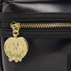 Black Loungefly Disney Snow White Evil Queen sling bag with embossed heart and dagger pattern, gold crown emblem and gold-tone hardware