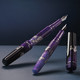 Icon Haute Fountain Pen - Benu. Benu Haute Icon fountain pen in deep purple-to-lilac shimmering resin with silver glitter, chrome trim, and multifaceted barrel, capped on white background.
