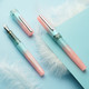 Pearle Haute Fountain Pen - Benu Haute Perle fountain pen in soft rose-mint shimmering resin with sparkling band, chrome trim, and multifaceted barrel, capped on white background.