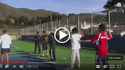 High school players learn serve with ServeMaster
