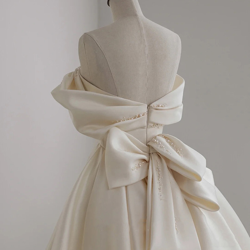 Exquisite Ivory Satin Sleeveless Strapless Long Wedding Dress with Ruffles
