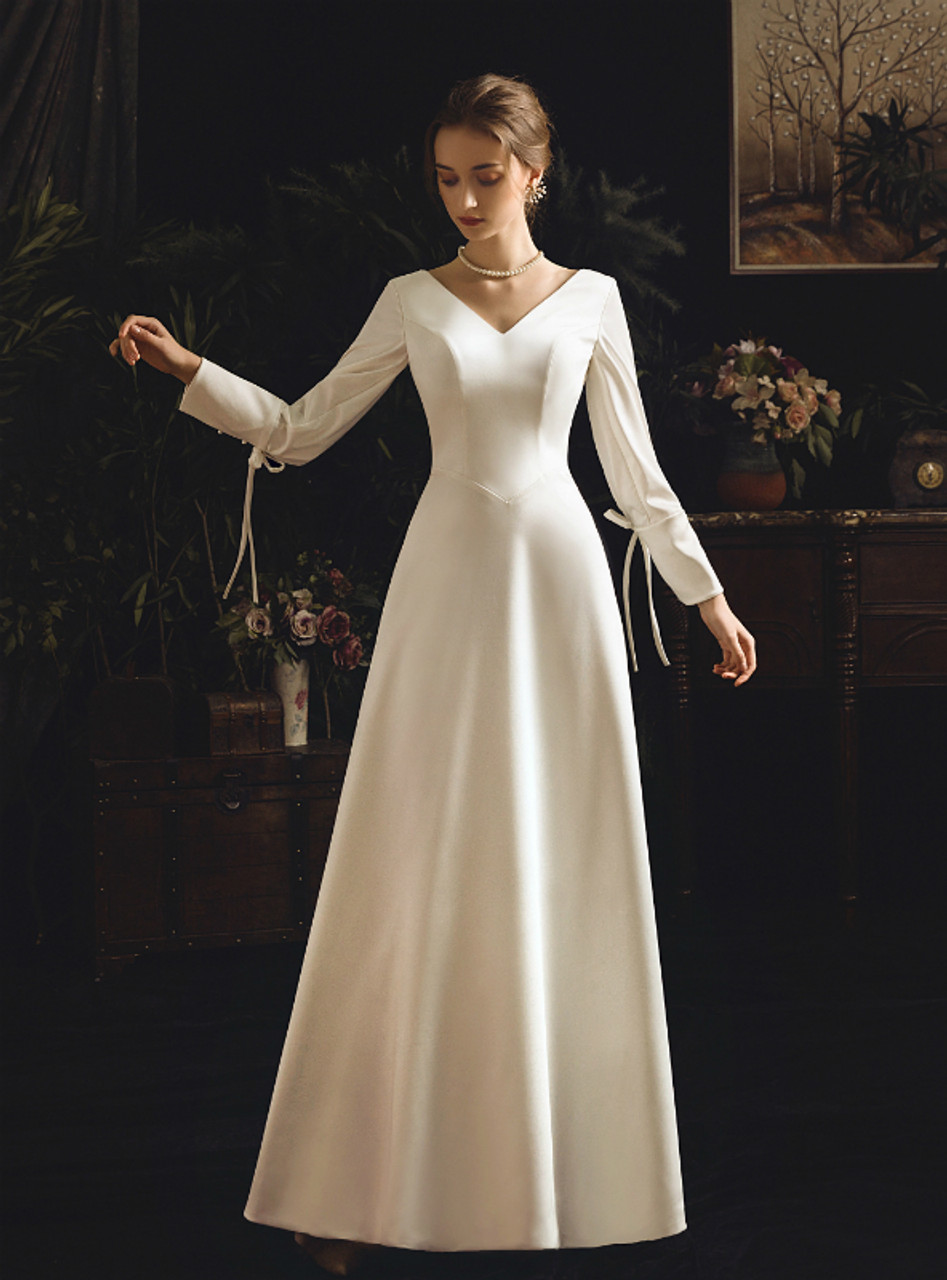 A Line White Satin V Neck Long Sleeve Backless Wedding Dress With Bow