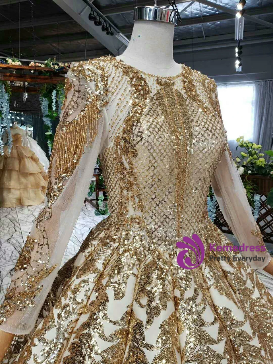 Gold sequin and beaded detail on long sleeve luxury ball gown wedding dress