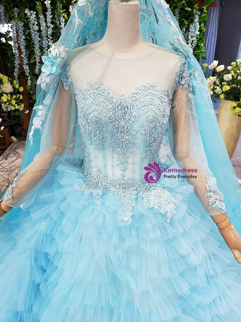 Sky blue ball gown wedding dress with beaded bodice, long sheer sleeves and layered tulle skirt