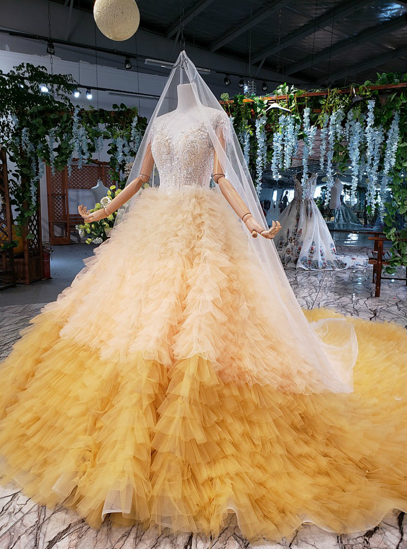 Brilliant yellow beaded ball gown wedding dress with full tulle skirt