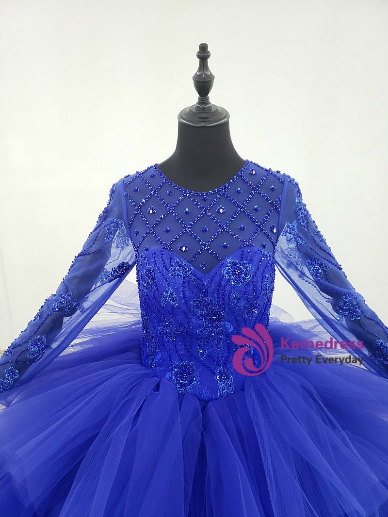 Royal blue tiered tulle ball gown wedding dress with beaded bodice and long sheer sleeves