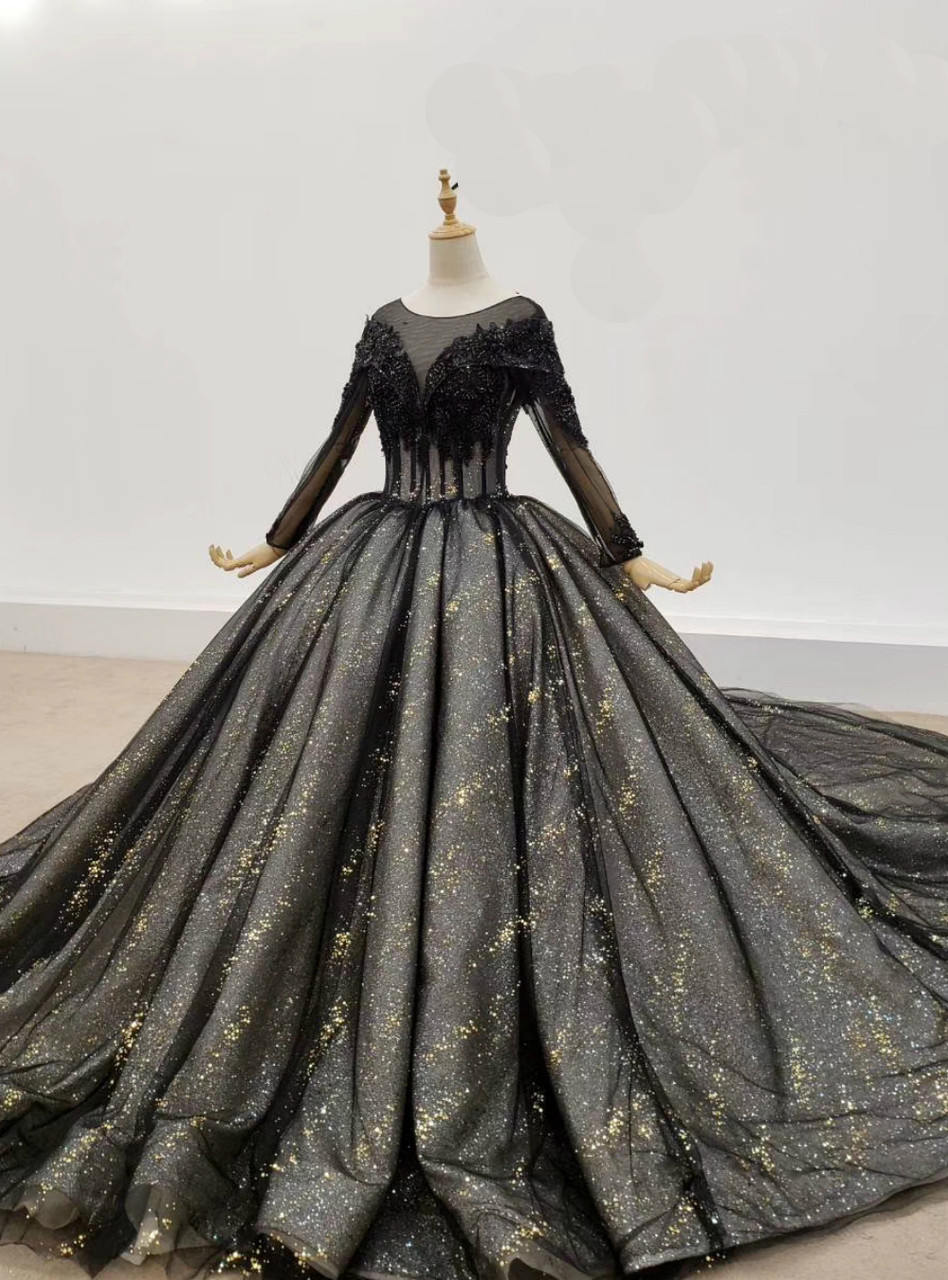 Black ornate wedding dress with long sleeves, appliqué, sequins and beading