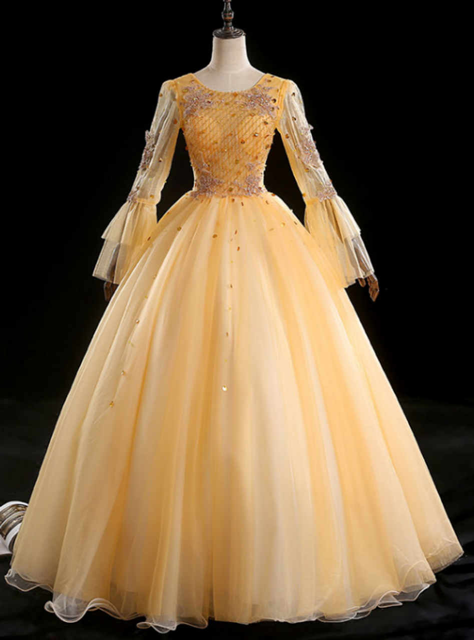 gold ball gown with sleeves