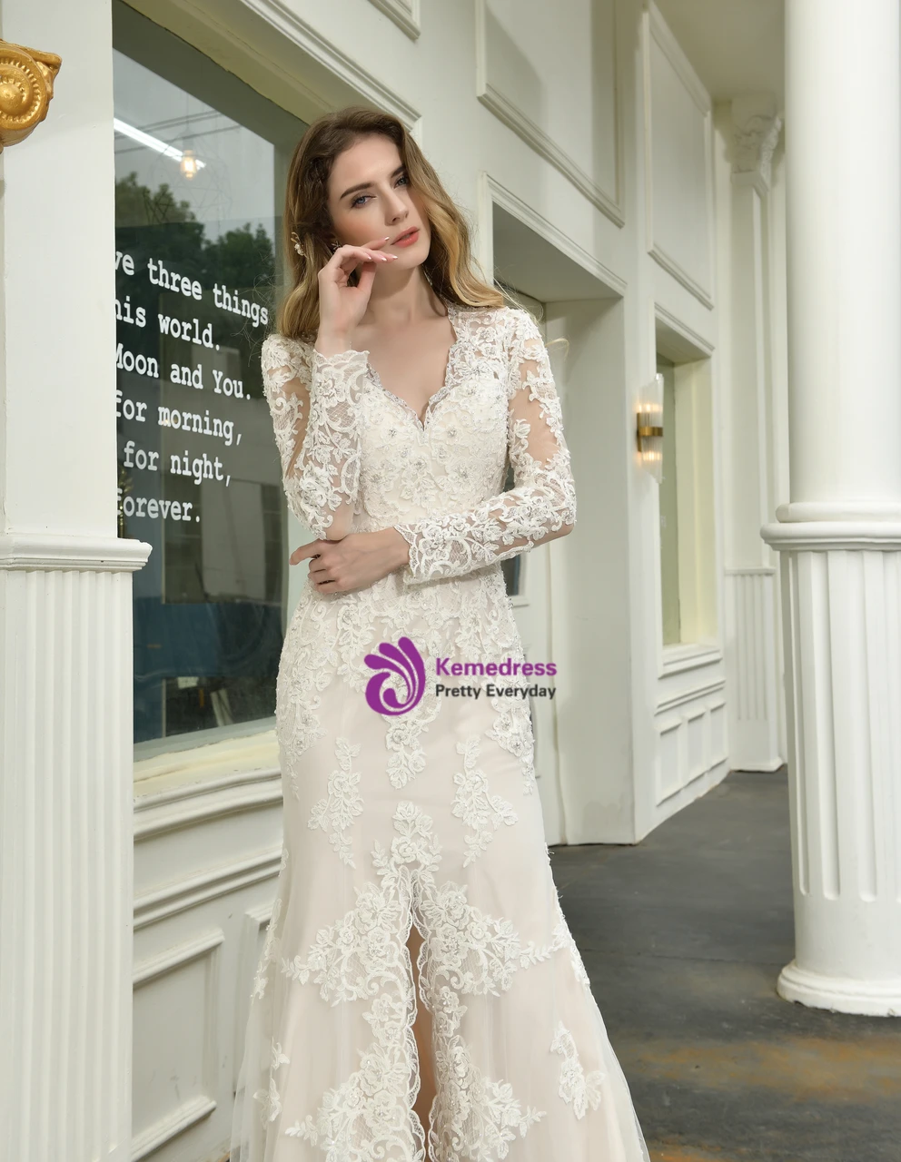 Champagne mermaid wedding dress with appliqué beading and floor length silhouette