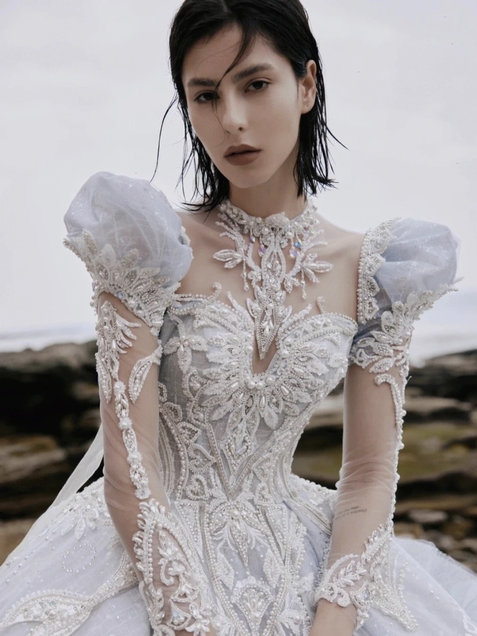 Princess blue tulle ball gown wedding dress with long sleeves, lace appliques and open back