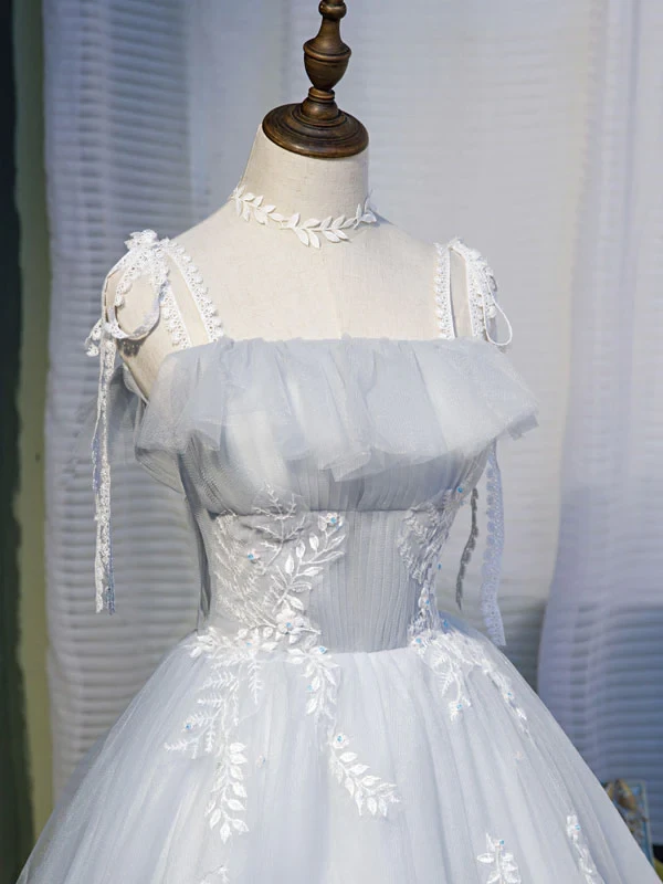 Silver embroidery and sheer puff sleeve detail