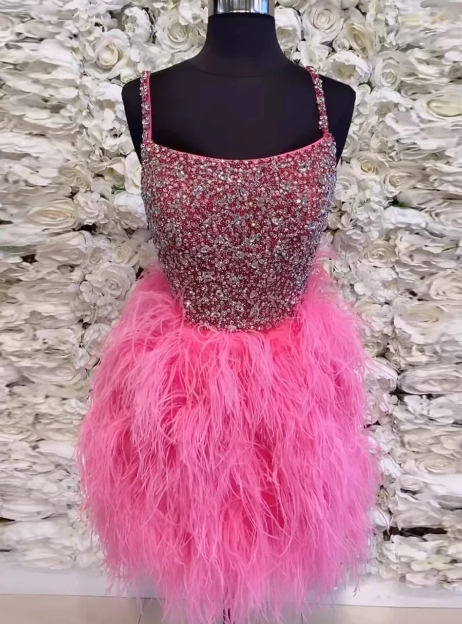 Hot pink feather homecoming dress with crystal beaded bodice and rhinestone straps