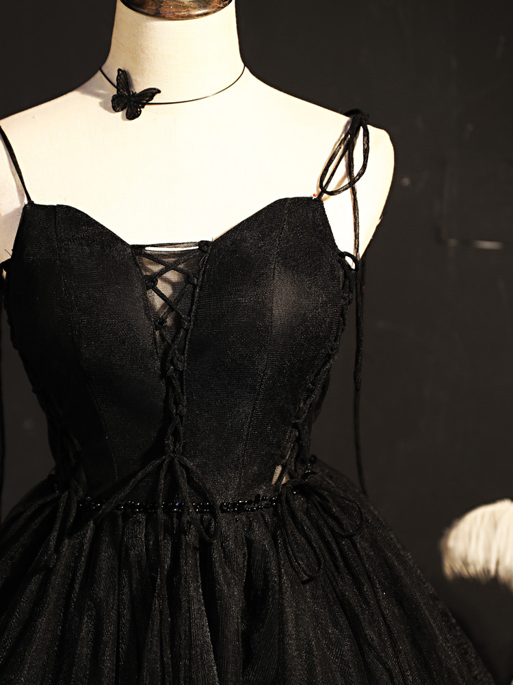Black tulle homecoming dress with beaded embellishment and delicate front spaghetti straps
