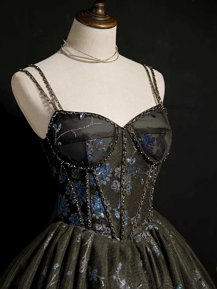 Black tulle homecoming dress with blue and silver floral sequins, beading and spaghetti straps