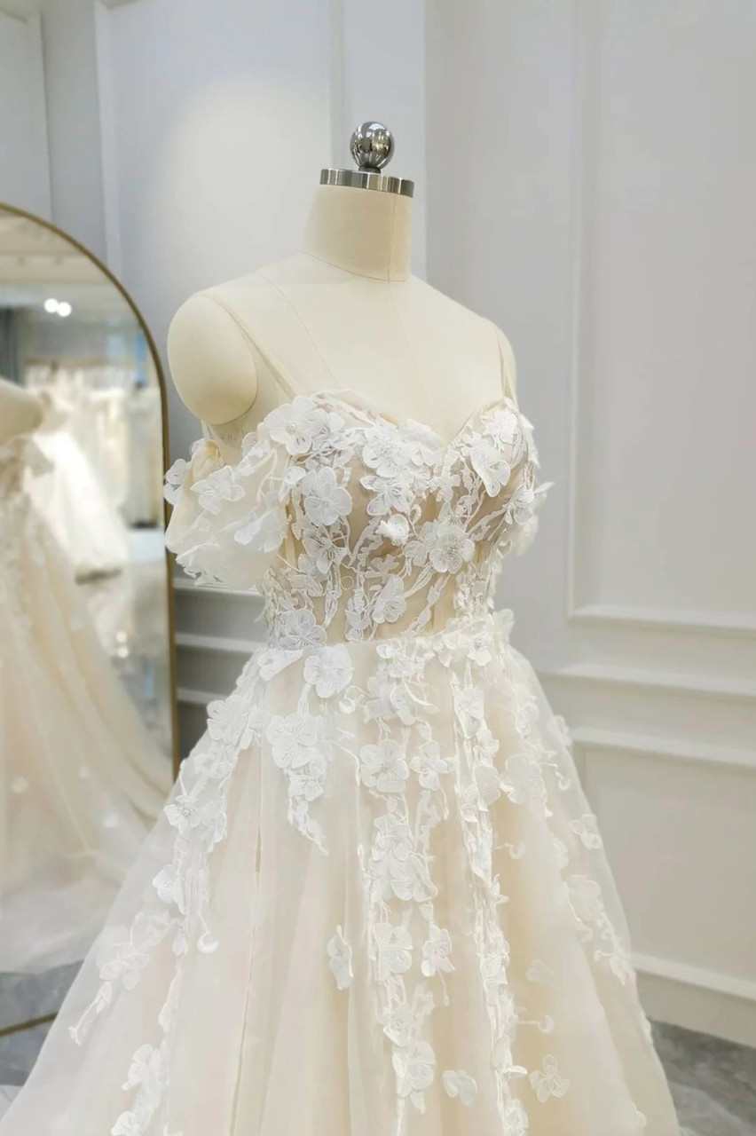 Ivory boho off the shoulder wedding dress with 3D floral lace appliques and tulle A-line skirt