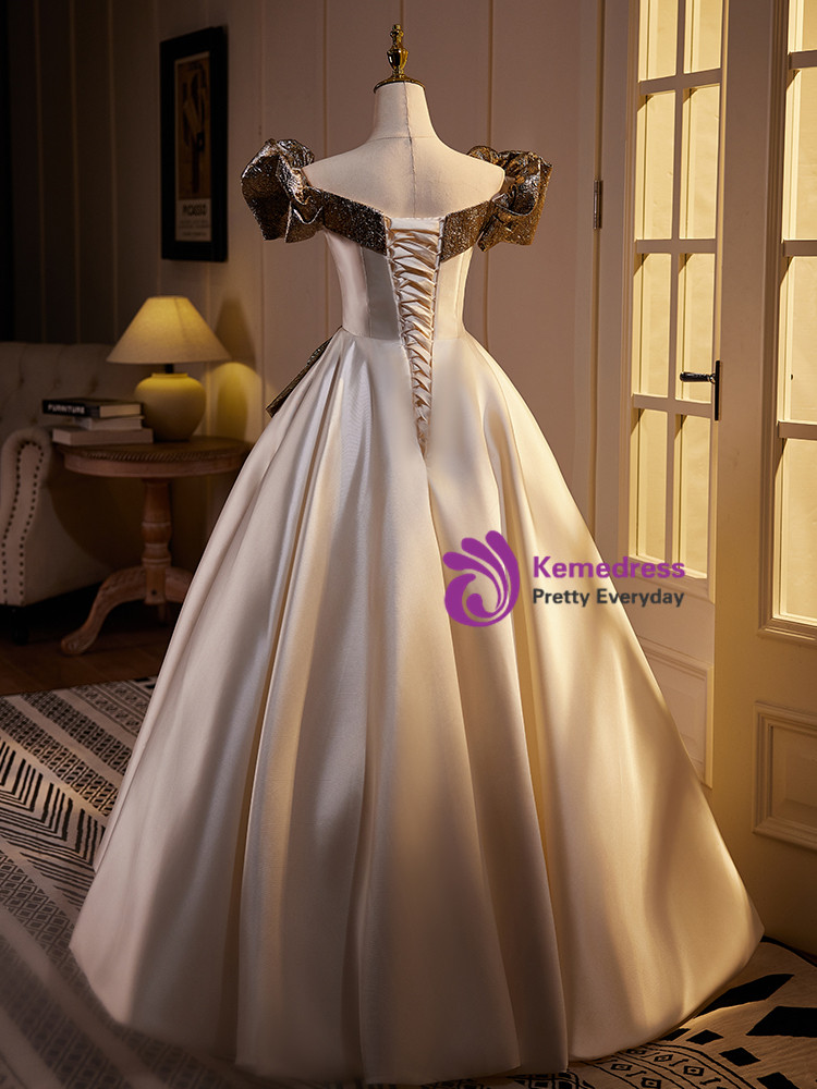 Champagne satin puff sleeved occasion dress