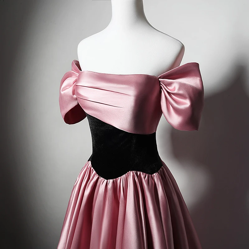 Pink satin floor length prom dress with black velvet off shoulder bodice and bow