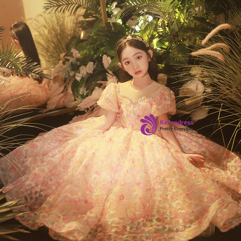 Pink floral tulle flower girl gown with beading and softly puffed sleeves