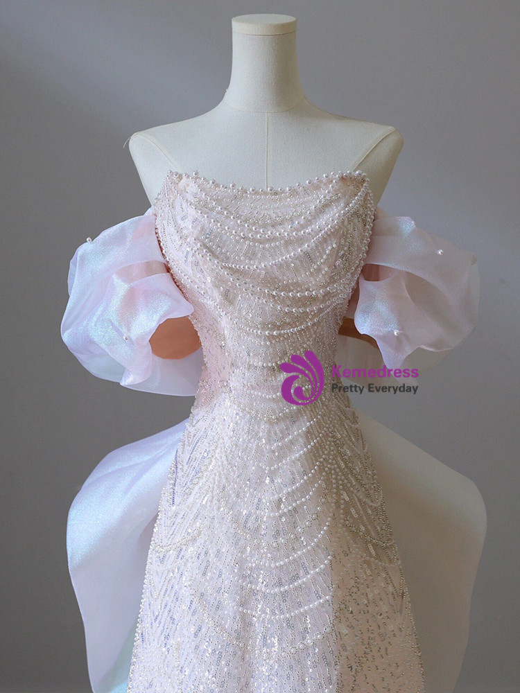 Full length pink A line sequin prom gown with pearl embellishment and flowing skirt
