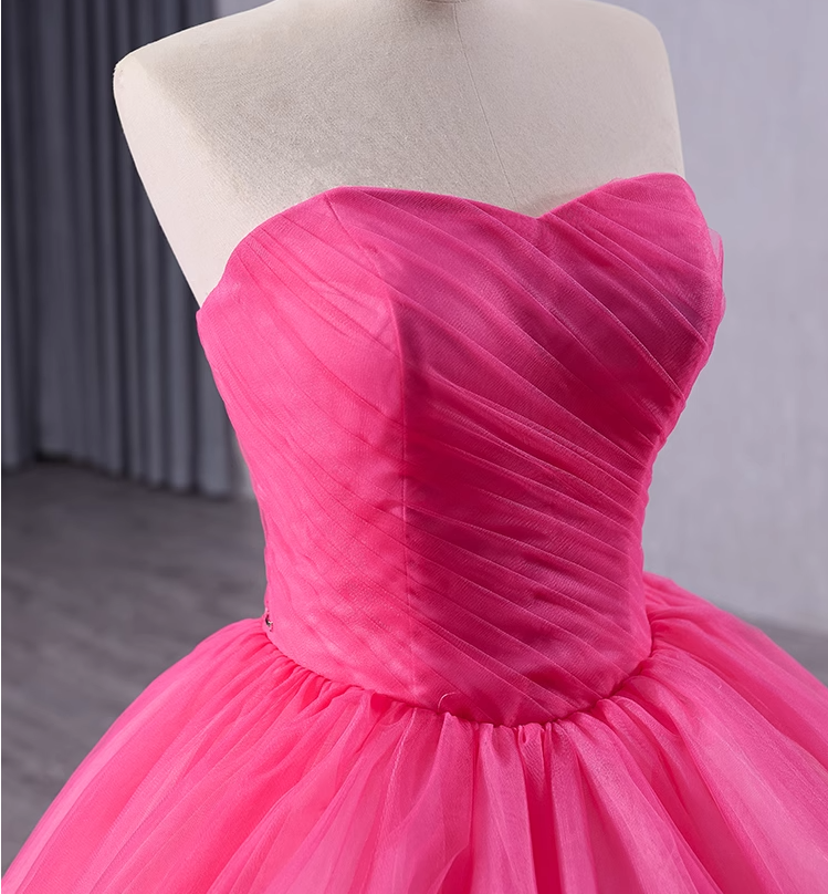 Fuchsia and pink tiered tulle ball gown with ombré color effect