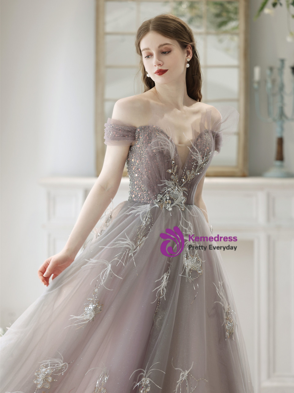 Long purple feather sequin prom gown with airy tulle A line silhouette