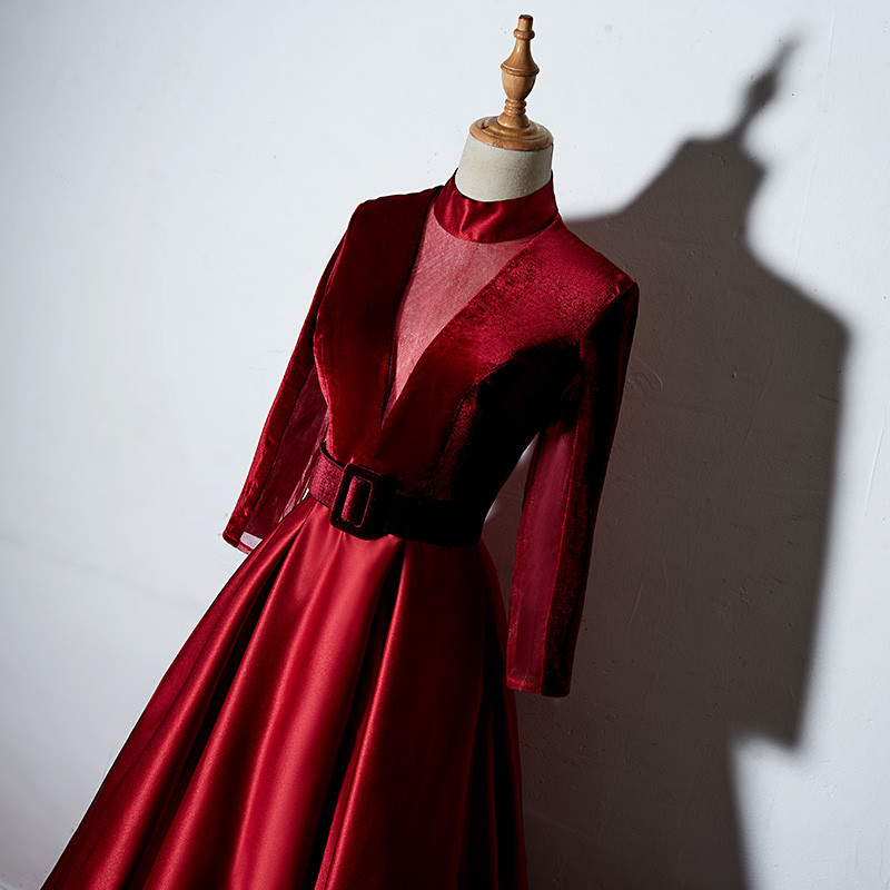 Burgundy velvet prom dress with sheer see through back and long sleeves