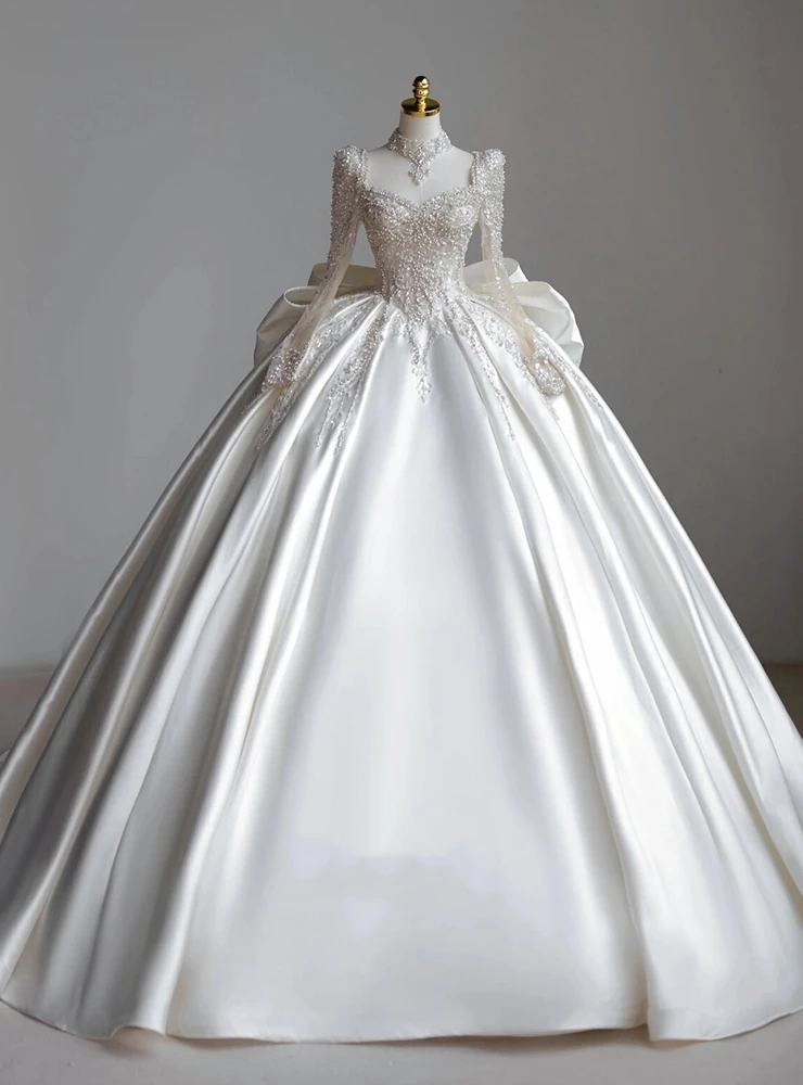 White satin high neck long sleeve beaded wedding dress