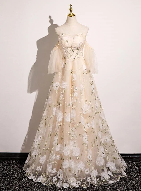 Champagne tulle strapless ball gown prom dress with gold beading and layered skirt
